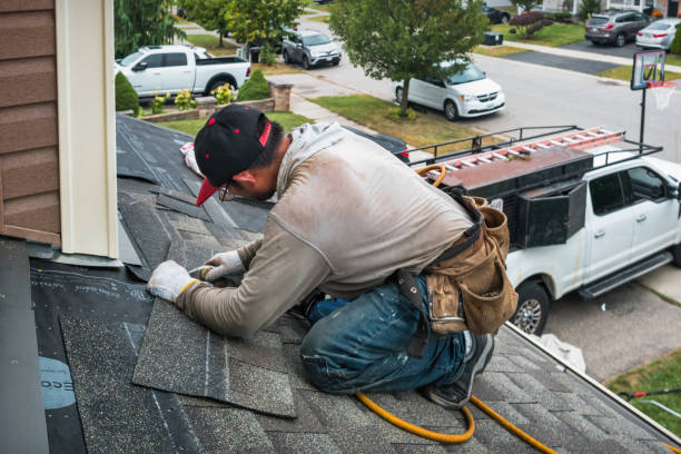 Professional Roofing technician working in Depoe Bay, OR